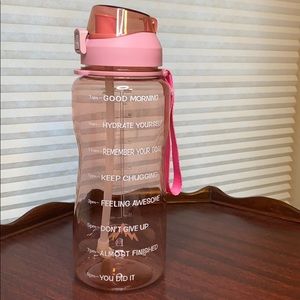 Light pink half gallon motivational water bottle